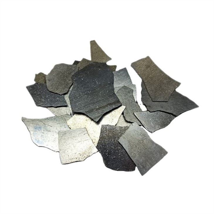 Mn โลหะ 99.7 เปอร์เซ็นต์ Electrolytic แมงกานีสโลหะเกล็ดสำหรับการผลิตเหล็ก